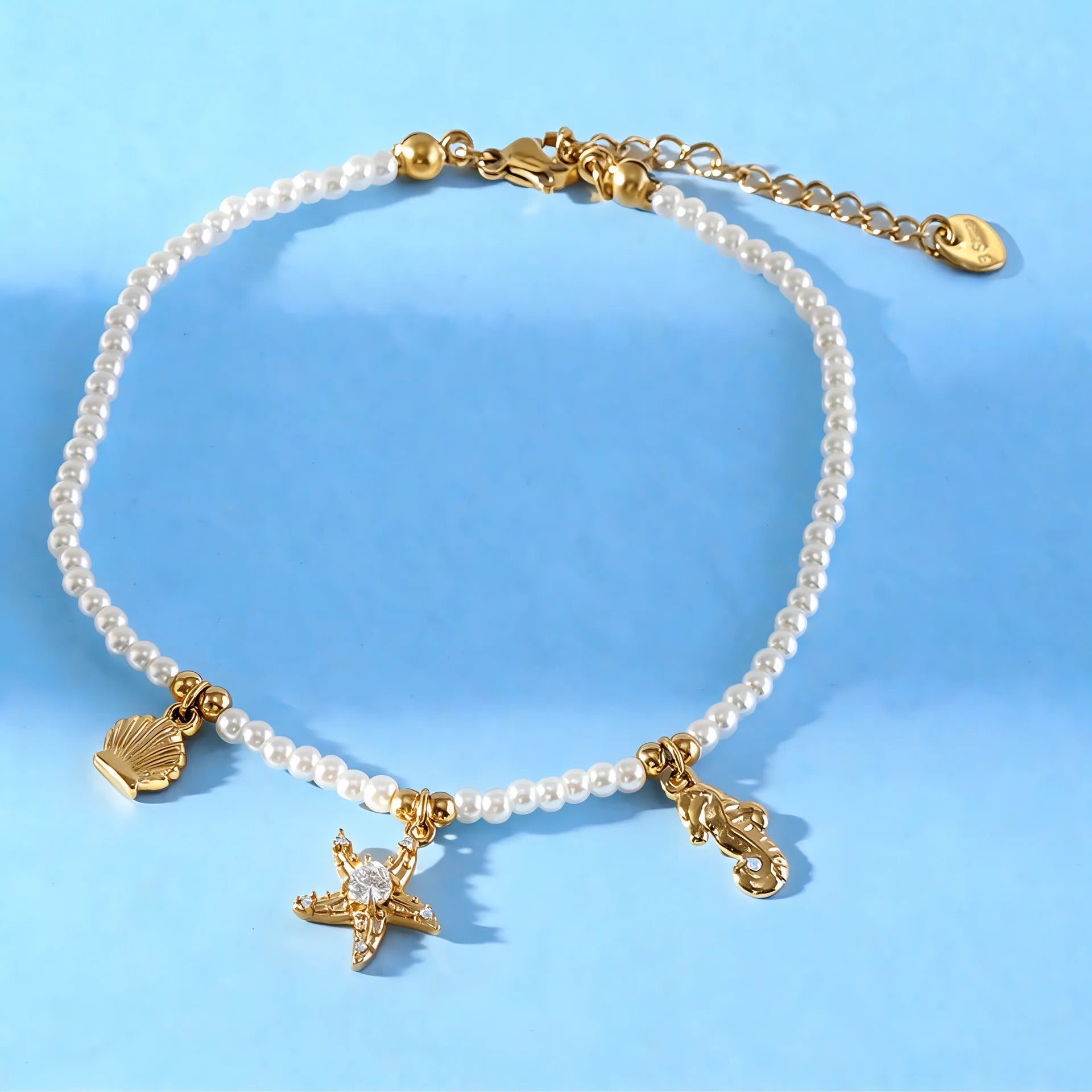 Collier pour chevilleCharms Océan — Acier Doré & Perles